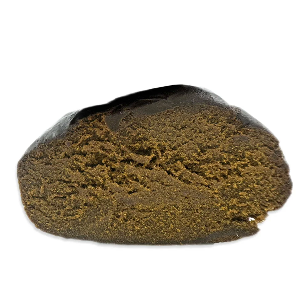 Bloque de Caramel hash CBD premium con textura visible en La Cosechera